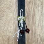 Μαύρη πλακέ λαμπάδα με μπεγλέρι